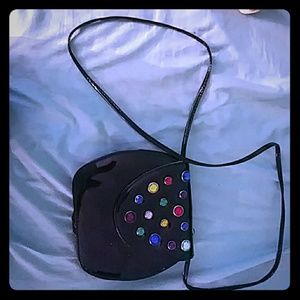 Handbag with jewels on it